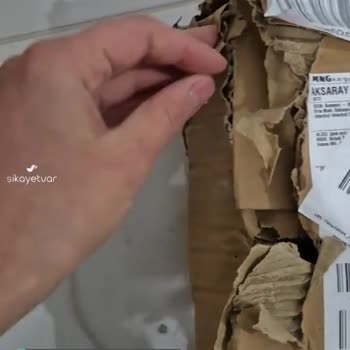 Amazon Kitap Kolisi Yağmurda Islanmış