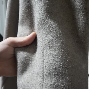 Koton Kaşe Kabanında Hızlı Tüylenme Ve Deforme Olma Sorunu