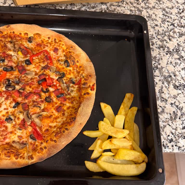 Domino’s Pizza Büyük Boyda Malzeme Azlığı
