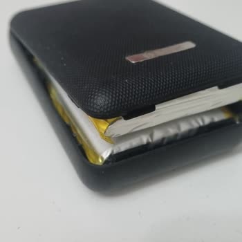 Şişmiş Pil Ve Açılan Kasa Nedeniyle S-Link 10000 Taşınabilir Şarj Cihazı İçin Değişim Talebi