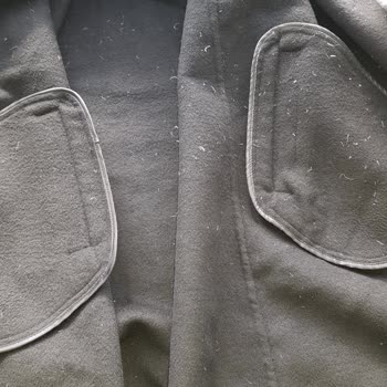 Tuğba Giyim Kaz Tüyü Kabanı İçinden Aşırı Tüy Döküyor