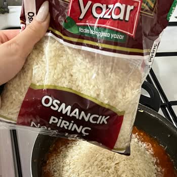 Yazar Bakliyat Pirinç Paketi İçinde Kurt Ve Taşla Karşılaştım
