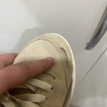 Kısa Sürede Burun Kısmı Yırtılan Nike Air Ayakkabısı İçin Açıklama Eksikliği