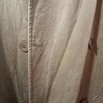 Yıkamada Rengi Solan Trençkot İçin Değişim Talebi