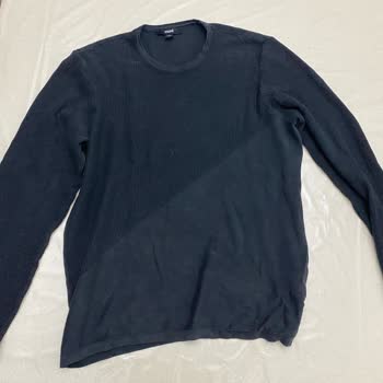 Kısa Sürede Esneyen Kazak Ve Mağazanın Reddettiği İade Talebi