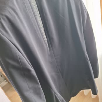 Ütüsüz Teslim Edilen Takım Elbise İçin Markanın Özür Ve Telafi Talebi