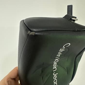 Calvin Klein Çantada Deri Kaplama Soyulması: Boyner'in Reddedilen Ayıplı Ürün İadesi Talebi