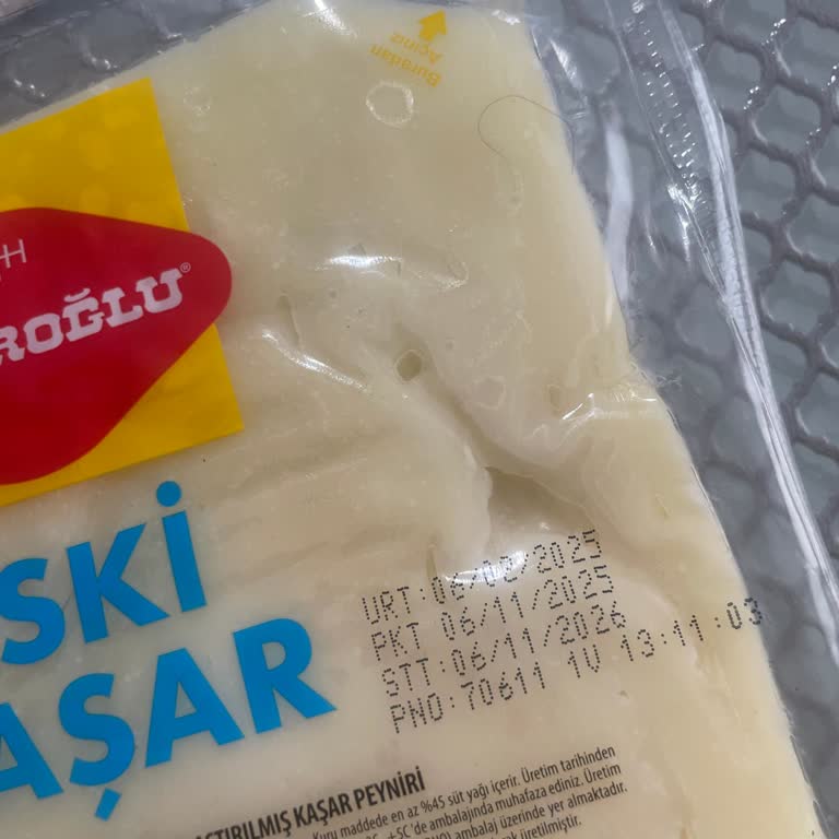 Migros Hemen Taciroğlu Kaşar Peynirinde Kıl Bulunması