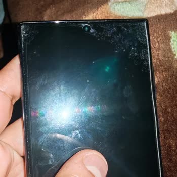 Kamera Lensinde Toz Ve Ekran Jelatini Bozulması