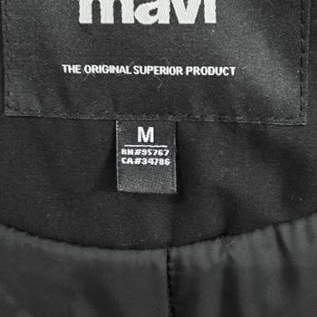 Mavi Montta %100 Polyester Etiketi Ve Kaz Tüyü İddiası Çelişkisi