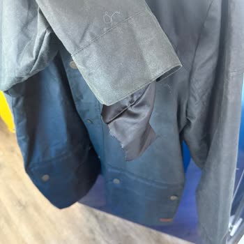 8000 TL'lik Yırtık Hediye Mont Astarı Ve Bozuk Paketleme