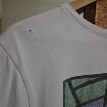 Arçelik 9100 DMX Çamaşır Makinesinde Kıyafetlerde Mercimek Büyüklüğünde Delikler Oluşturuyor