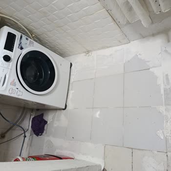 İzmir Doğalgaz'ın Asfalt Hatası Nedeniyle Yağmur Suyu Sızıntısı Ve 36.000 TL Zararı