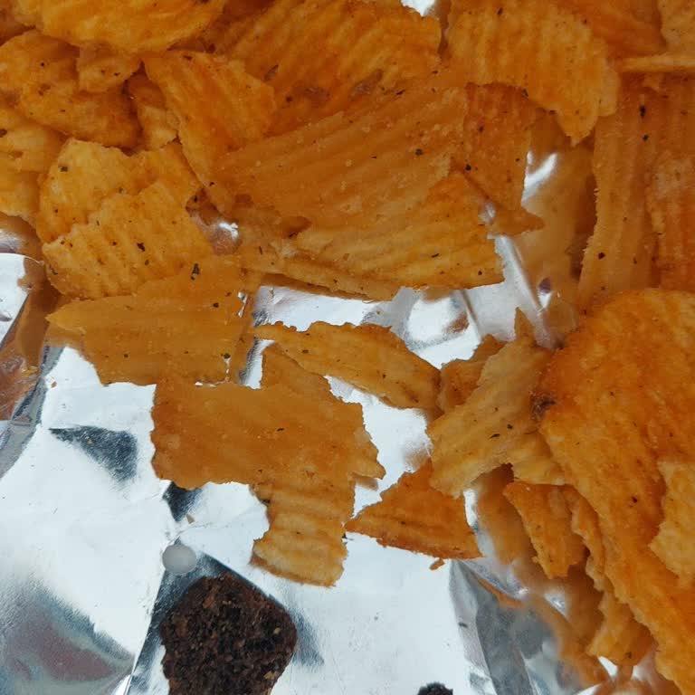 Doğuş Çay’ın Yanmış Cipsleri Sağlık Endişesi Yarattı, Firma Sessiz Kaldı