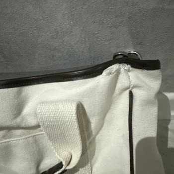 Midi Kanvas Çok Cepli Çanta Düşük Isıda El Yıkamasına Rağmen Kenar Dikişleri Ayrıldı Ve Kırıştı