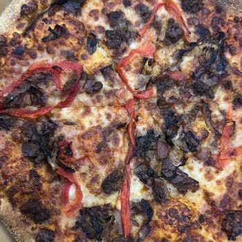 Domino’s Şubesinden Yanmış Pizzalar İçin Ücret İadesi Talebi