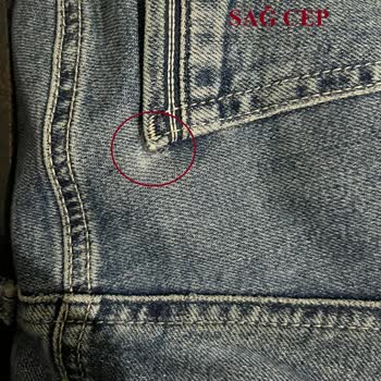 Mavi Pantolonun Arka Cebinde Hızlı Yırtılma