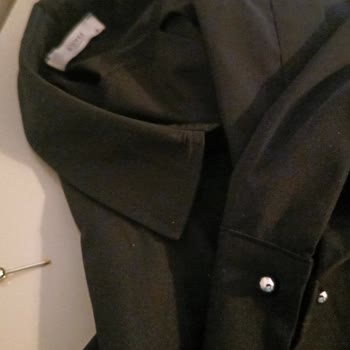 Zühre Tekstil Ürünü İlk Kullanımımda Kol Düğmesi Yerinden Kopup Düştü