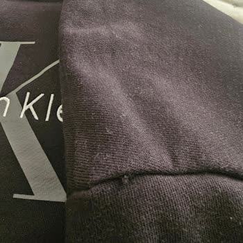 Boyner Calvin Klein Sweatshirt'unda Renk Solması Ve Omuz İplikleri Çıkması