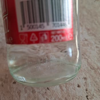 Açılmamış Şişede Beyaz Parçacıklar Bulunması Sağlık Endişesi