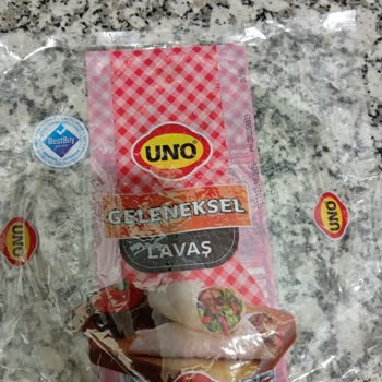Uno Ekmek Lavaşların Tamamının Birbirine Yapışık, Ayırmaya Çalıştığımda İse Yırtıldığını Gördüm