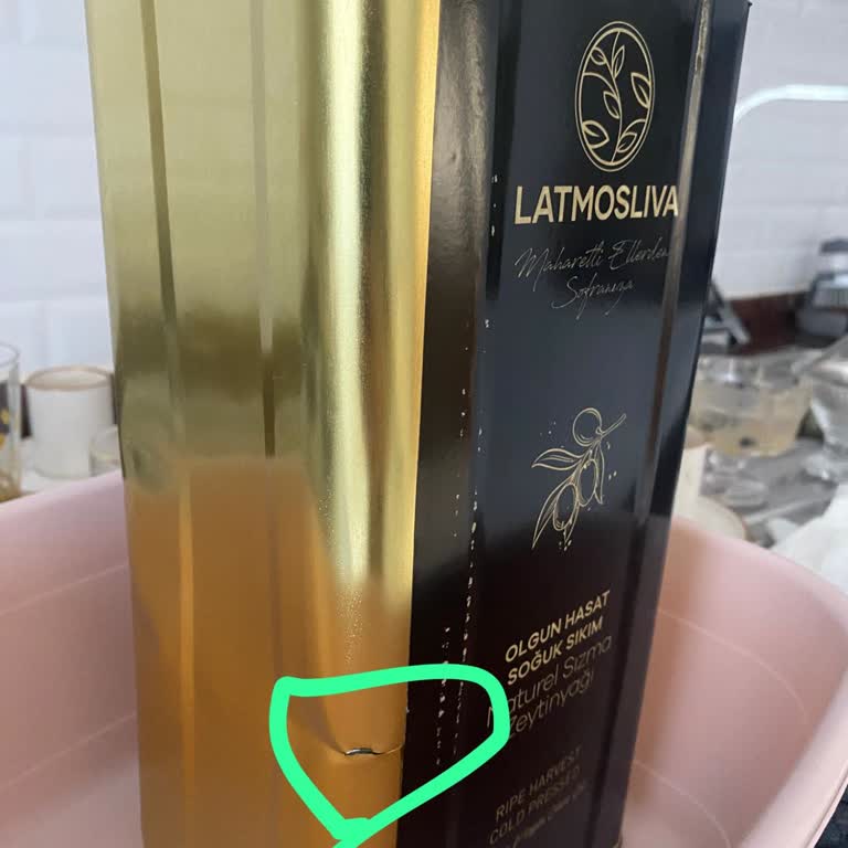 Teneke Zeytinyağı Gönderiminde DHL Kargo'nun Özensiz Taşıması Sonucu Delindi