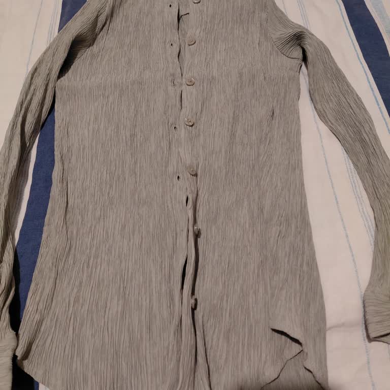 İlk Yıkamada İki Beden Küçülen Gömlek İçin Hemen Değişim Talebi