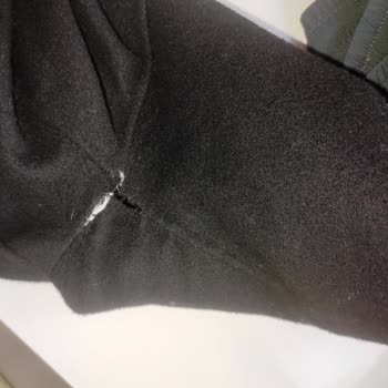 Kaz Tüyü Yelekli Kabanın Dikiş Sorunu Ve Ücretsiz Değişim Talebi