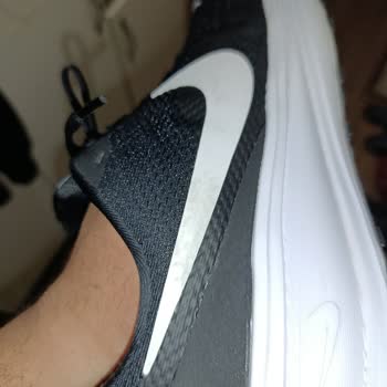 Nike Revolution 8 Logo Swelling After Few Wears - User Error Claim