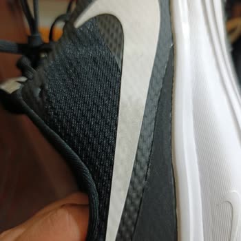 Nike Revolution 8 Logo Swelling After Few Wears - User Error Claim
