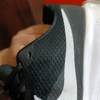 Nike Revolution 8 Logo Swelling After Few Wears - User Error Claim