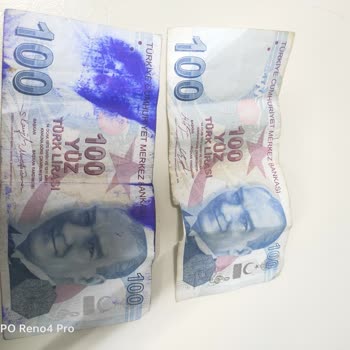 ATM'den Çıkan Yırtık Ve Mürekkep Lekeli Banknot Ve Şubedeki Kaba Tutum