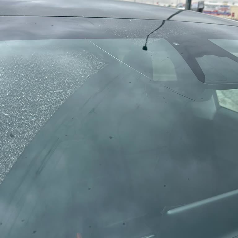 Tesla Model Y Windshield Cracked Without Impact—Warranty Claim