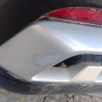 Arka Tampondaki Nikelaj Parçalarının Soyulması Garanti Kapsamında Değiştirilmelidir