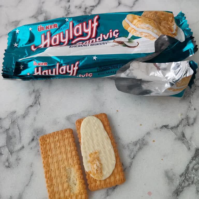 Migros'tan Alınan Ülker Hindistan Cevizli Bisküvi'de Plastik Ve Gaz Benzeri Ağır Tat Şikayeti