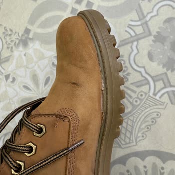 Timberland Botumdaki İşçilik Hatası Ve Teslim Gecikmesi İçin Telafi İndirimi Talebi