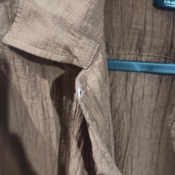 Premium Gömlek İlk Yıkamada İki Beden Küçüldü Ve Yırtıktı