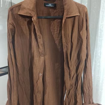 Premium Gömlek İlk Yıkamada İki Beden Küçüldü Ve Yırtıktı