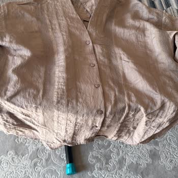 Üretim Hatası Nedeniyle Yırtılan Gömlek İçin Değişim Talebi