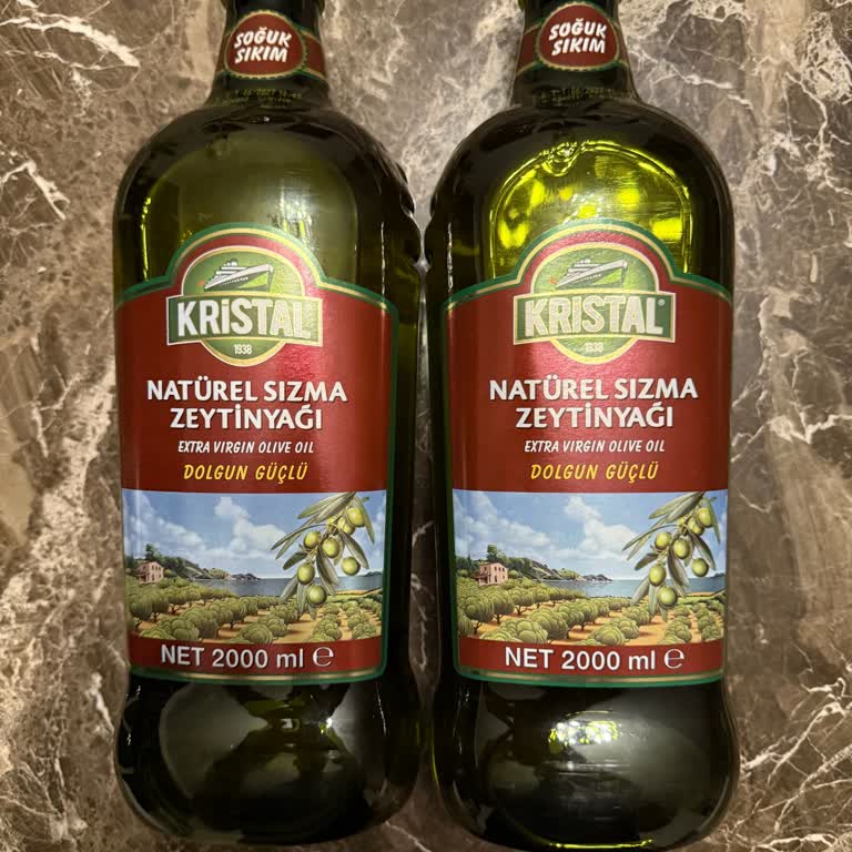 Carrefour SA Siparişte Görüntülenen Teneke Zeytinyağı Yerine Plastik Kapla Gelen Ürün