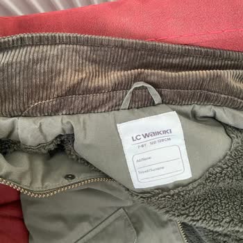 Çocuk Montunda İlk Yıkamada Renk Solması Ve Tüy Dökülmesi