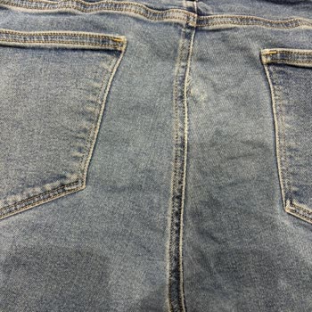 Mavi Kot Pantolonun Ağ Kısmındaki Erime Ve Açılma Nedeniyle Değişim Talebi