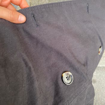 İlk Yıkamada Solan Siyah Trençkot İçin İade Talebi