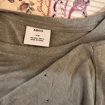 Mango'da Yeni Aldığım Tişörtte Kolunda Delik, Kullanıcı Hatası İddiası Ve Değişim Talebi