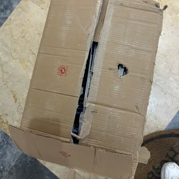DHL Kargo'nun Özensiz Teslimatı Ve Kırık Karton Nedeniyle Mağduriyet