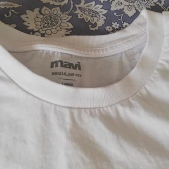 Amazon Mavi T-shirt Ambleminin Üç Yıkamada Sökülmesi Ve Deforme Olması