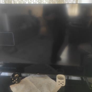 TCL 50 İnç Televizyonun Koyuluk, Titreme Ve Çizgiler: Garanti Dışı Arıza Ve Değişim Talebi