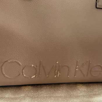 Calvin Klein Çanta Ve Cüzdan Setinde Deri Soyulması, Mağaza Değişim Reddedildi