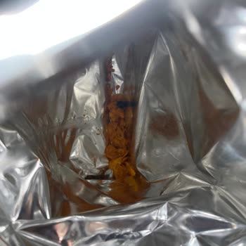 Patos Taco Baharatlı Cipsinde Yanmış Köz Parçası