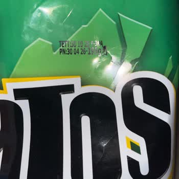 Patos Taco Baharatlı Cipsinde Yanmış Köz Parçası
